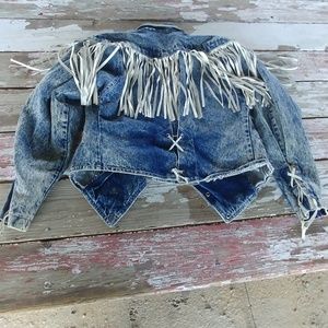 Denim jacket with white fringe